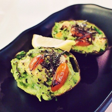 Think baked potato but with avocado, Aburi salmon and diced tomatoes. 