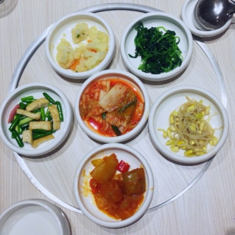An array of Korean side dishes. Refillable too!