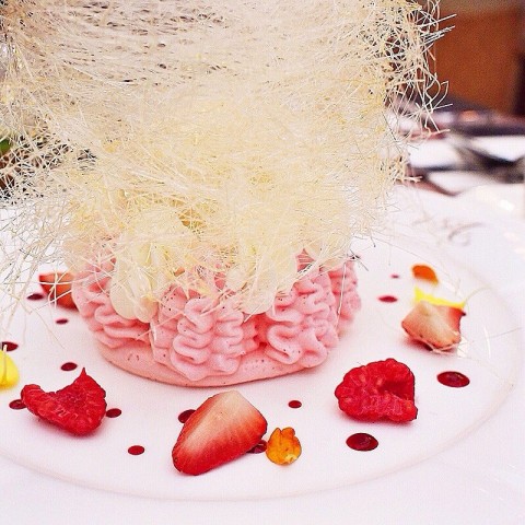 Sweet tower of spunned sugar atop rose meringue with yuzu and cream!