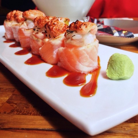 Salmon sushi with avocado and mentai mayo.