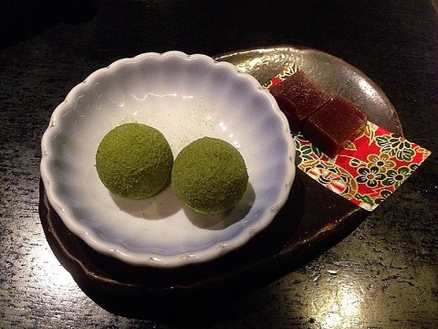 Chocolate bar coated with macha; red bean cubes