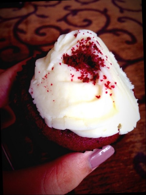 Slightly squished frosting but super moist and delicious red velvet!