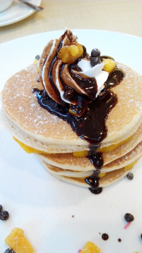 mango pancake with added chocolate syrup