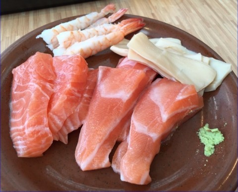 Very thickly sliced fresh salmon sashimi. 