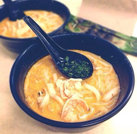 Having some laksa with spoon hehe