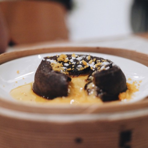 Salted egg filling goes surprisingly well with the chocolate exterior