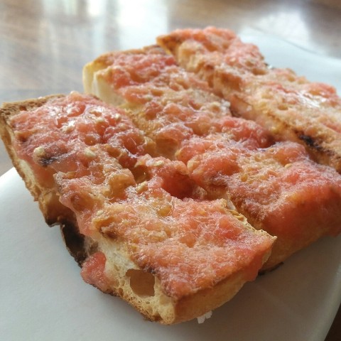 Fresh tomato rubbed on baguette & drizzle with olive oil 