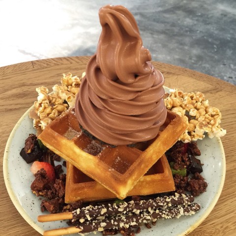 Double slice waffle with dark chocolate ice cream and premium toppings. 
