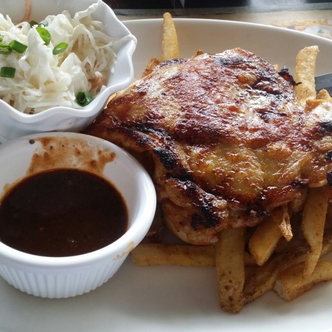 Juicy boneless chicken thigh, served with black pepper sauce and french fries and coleslaw!
