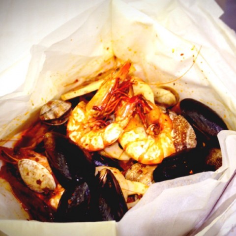 Parchment paper baked seafood ! All the seafood goodness in a bag ! 