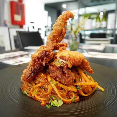 Crisp soft shell crab and pasta with a nice spicy kick! 